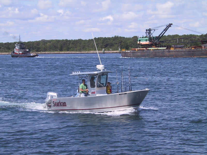 060826capecodcanaltugboatbargesportboat.jpg