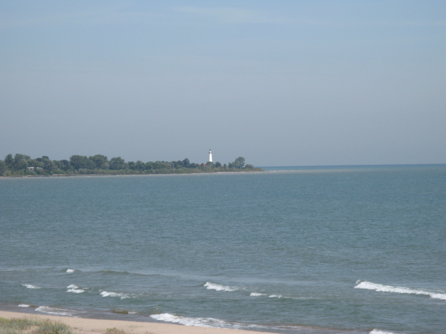 Lake Michigan with lighthouse in distance